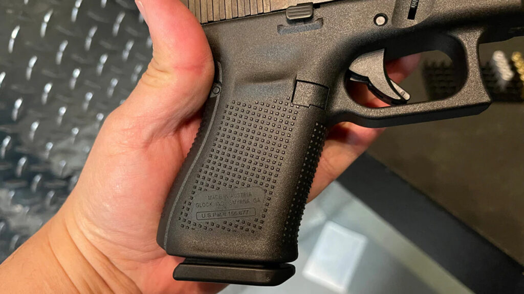 The Glock 19 Gen 5 implemented the same texture on the grip as the Gen 4, but took the finger grooves out for the Gen 5. Photo credit to Adam Campbell/Guns.com