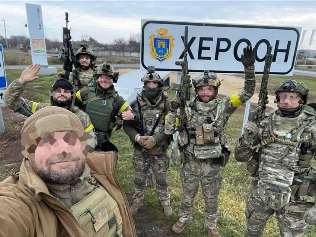 Ukrainian soldiers in a variety of equipment, including various weapons and even different camo patterns for the carriers of their armor plates.
