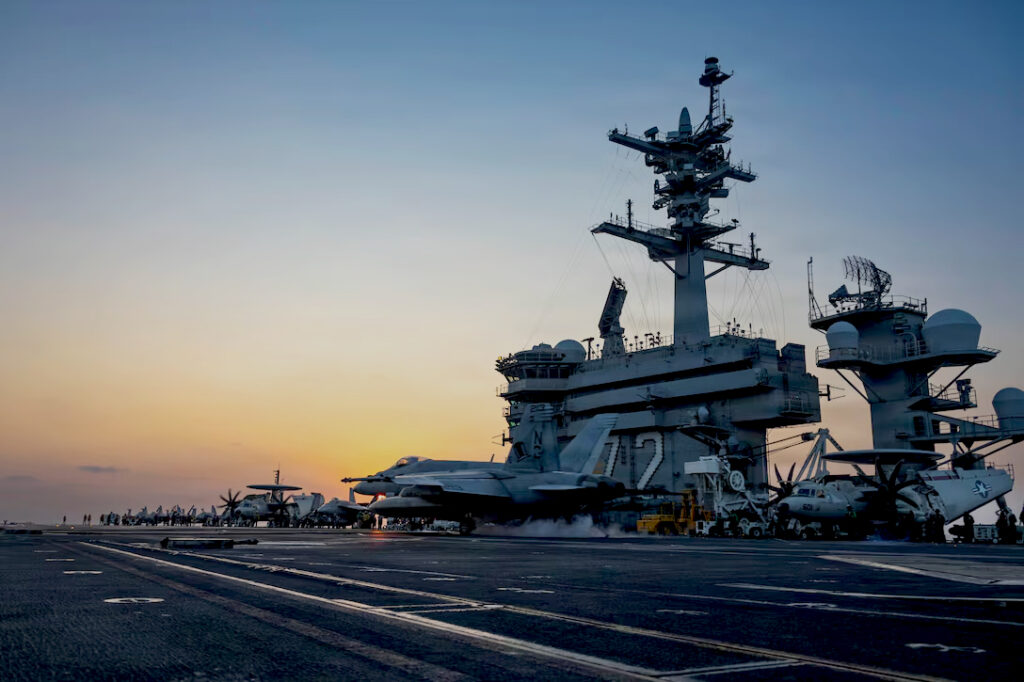USS Abraham Lincoln, flagship of Carrier Strike Group 3, recovering aircraft in Arabian Sea.